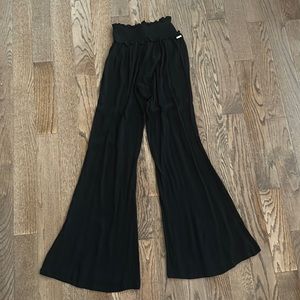 Used black Raisin jumper pants
